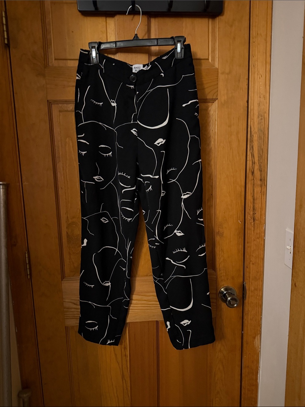Princess Polly Black Pants with White Abstract Face Print